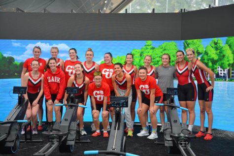 Clark University Rowing Team pictured at Head of Charles Regatta (image courtesy of Clare Johnston, 24)