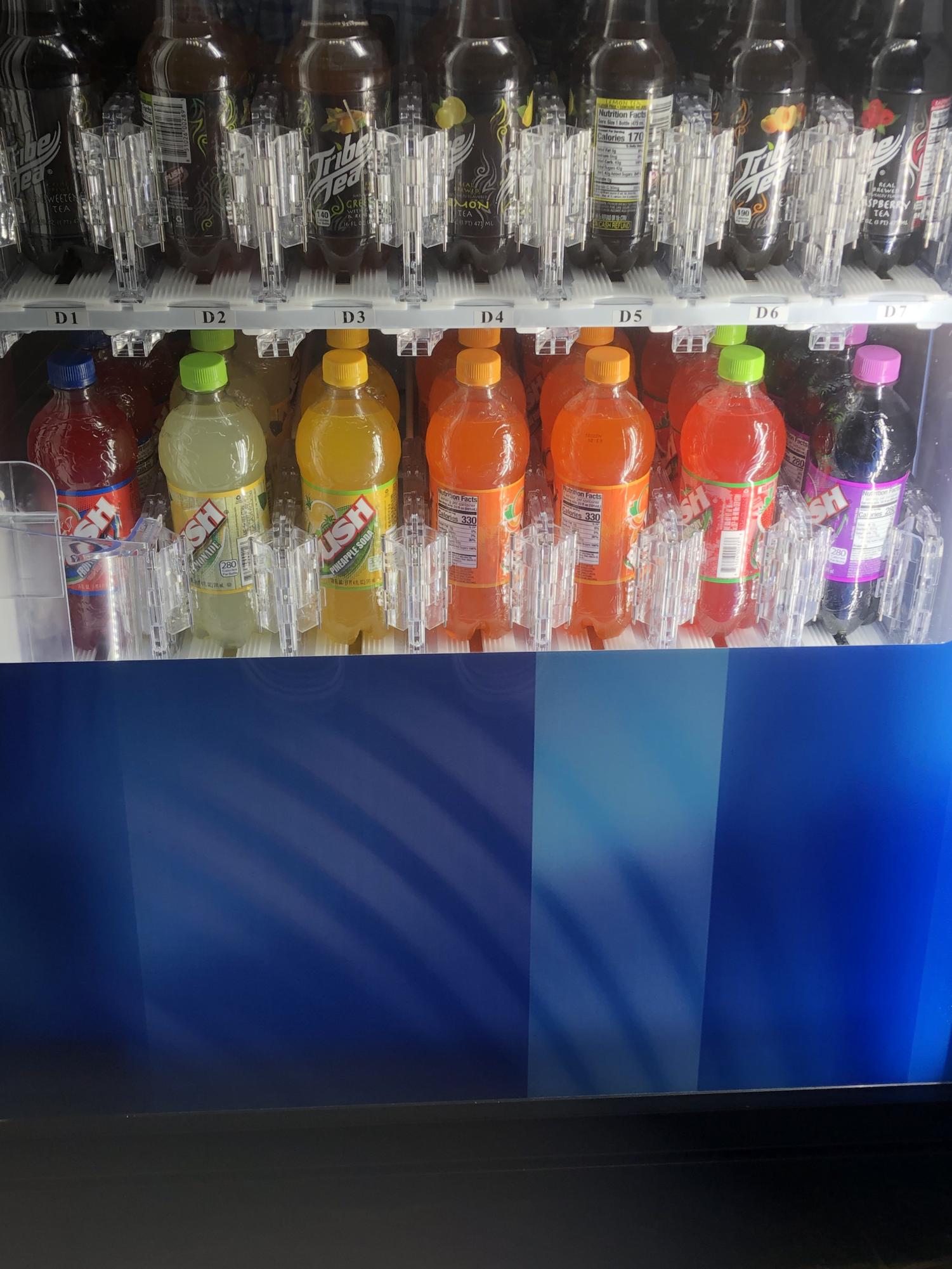 Push soda in a vending machine.