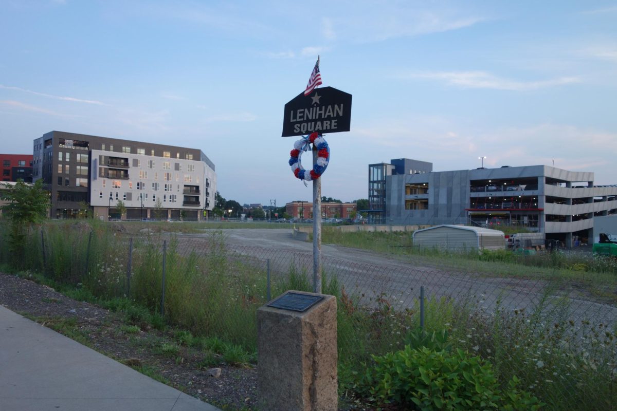 The sign for Lenihan Square at the corner of Madison Street, outside of Polar Park in the Canal District, Worcester, MA, Jul. 30, 2024.