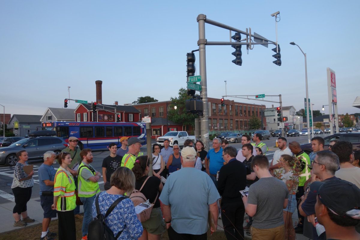 The group of auditors circled Jeff Speck as he spoke on the corner of Park Avenue and Chandler Street on September 12.